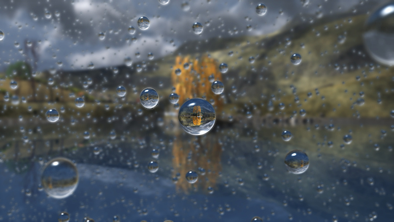 A short-focus render of a dark, rainy day in a northern mountain glen. In the background are grey-brown hills and a willow tree with its yellow fall leaves on an island in a silvery lake. In the foreground are raindrops frozen in midair, with one in the middle bringing the golden willow and its reflection into sharper focus.