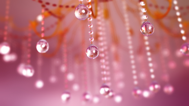 A 3D macro shot of a crystal chandelier. Myriads of strands of sparkling glass beads catch the light to create a lovely bokeh in the background. The blurred glass drops are reflected clearly in the sharply focused crystal balls in the foreground. The gold branches of the candelabra and soft pink atmosphere and lights give a sunset glow to the piece.